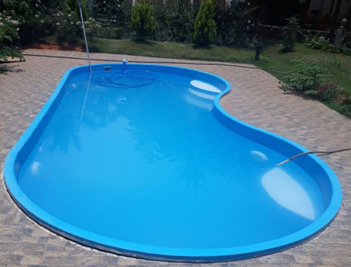 Fiberglass Bean Shaped Swimming Pool Manufacturer in Vadodara